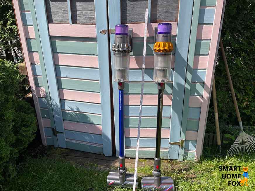 Both devices stand side by side with a measuring tape